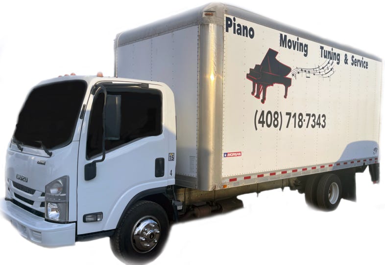 Delivery worker sorting and organizing cardboard boxes in van for shipment.
